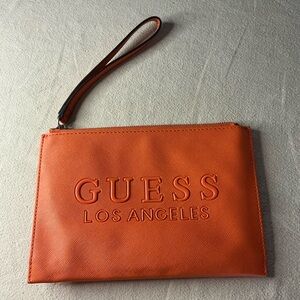 GUESS Orange Embossed Los Angeles Wristlet Clutch